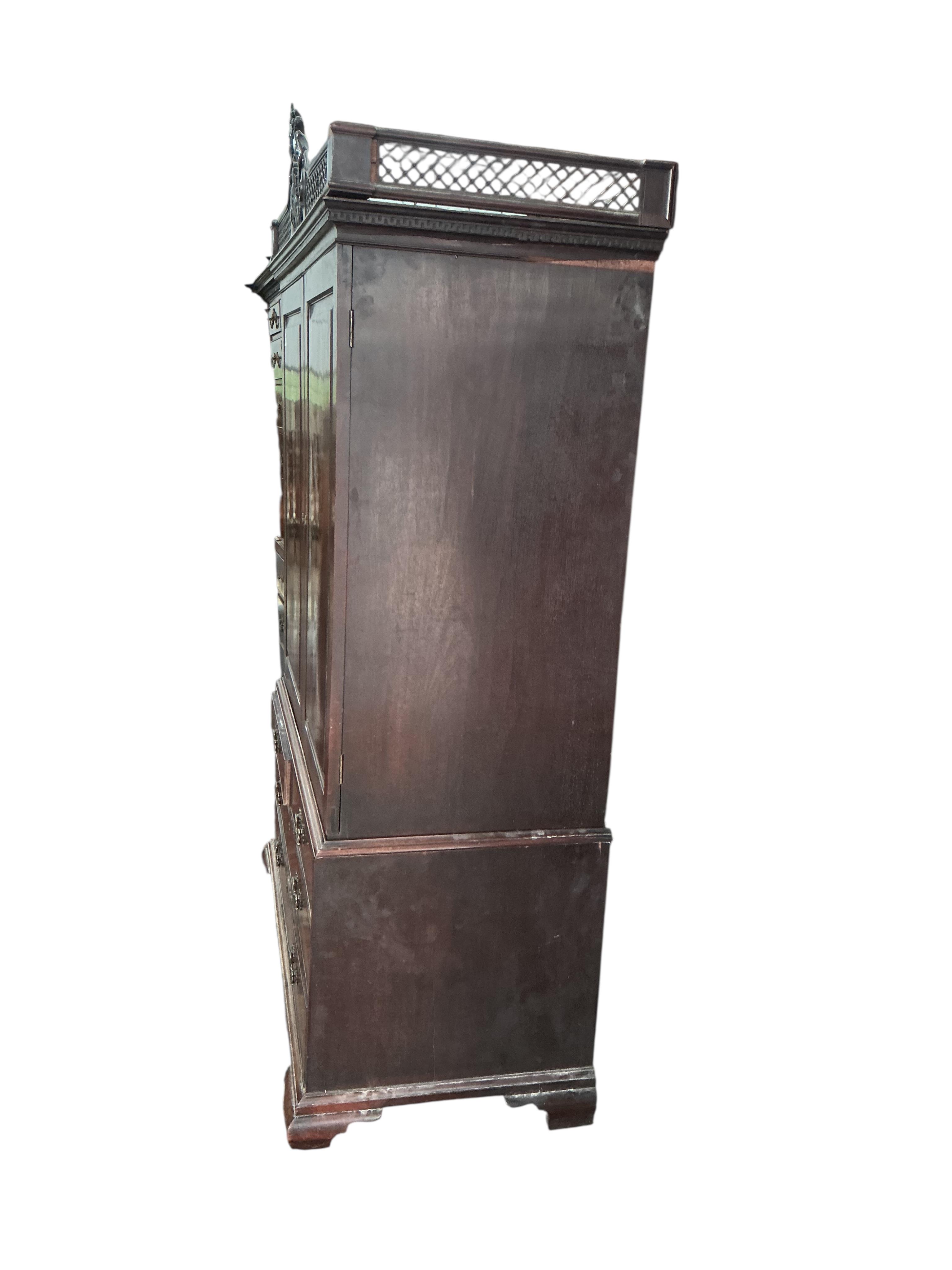 A George III Cuban mahogany linen press, lacking trays, converted to a hanging wardrobe, width 124cm, depth 60cm, height 210cm